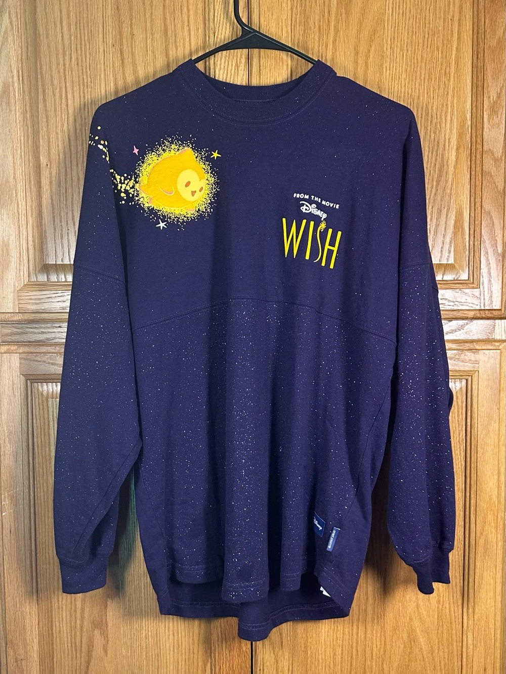 Disney Navy Crewneck Sweatshirt with Yellow Starburst Graphic